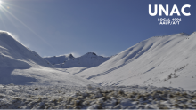 photo of snowy mountains with "UNAC local 4996 AAUP/AFT" in upper right